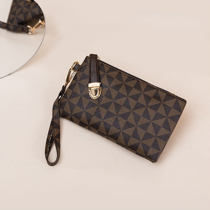 The chic wristlet clutch has a anti theft lock, it can hold phones and many small things.