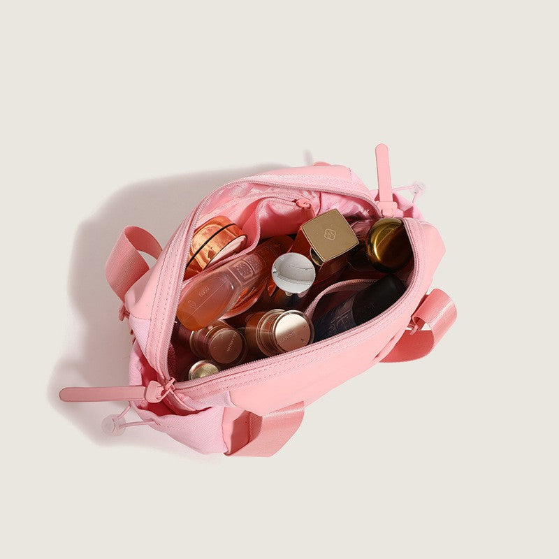 The Belluova mini gym bag is spacious, with multi pockets for phone, power bank, bottle, makeup, cosmetics