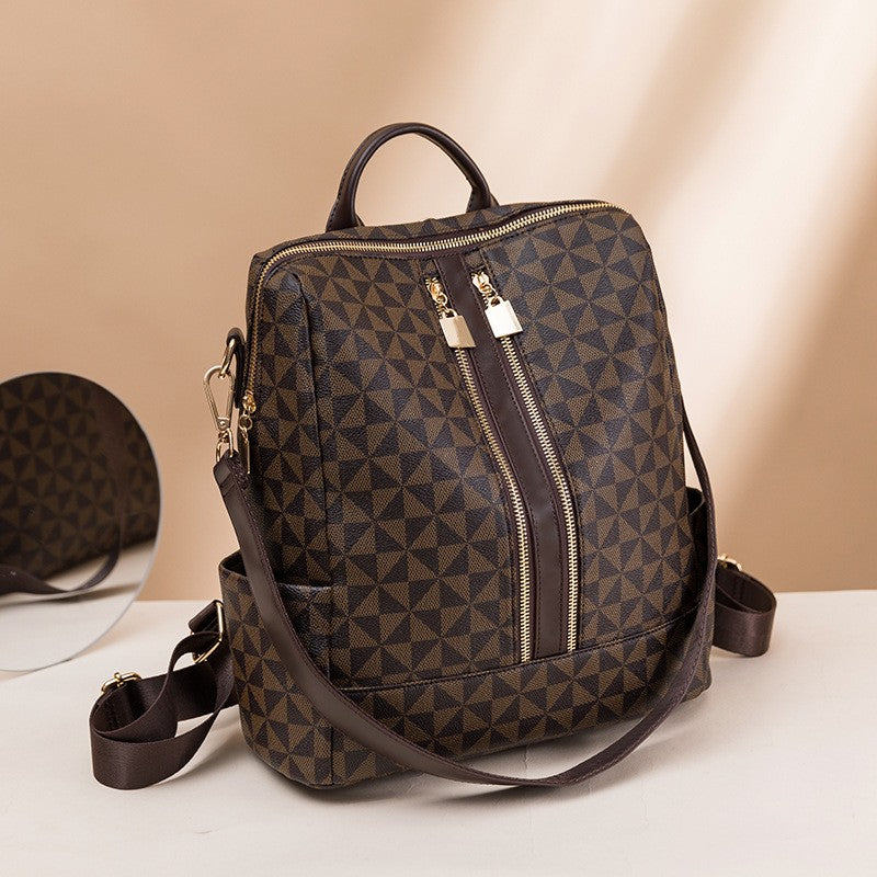 The coffee brown convertible shoulder laptop backpack ladies come with a one shoulder strap.
