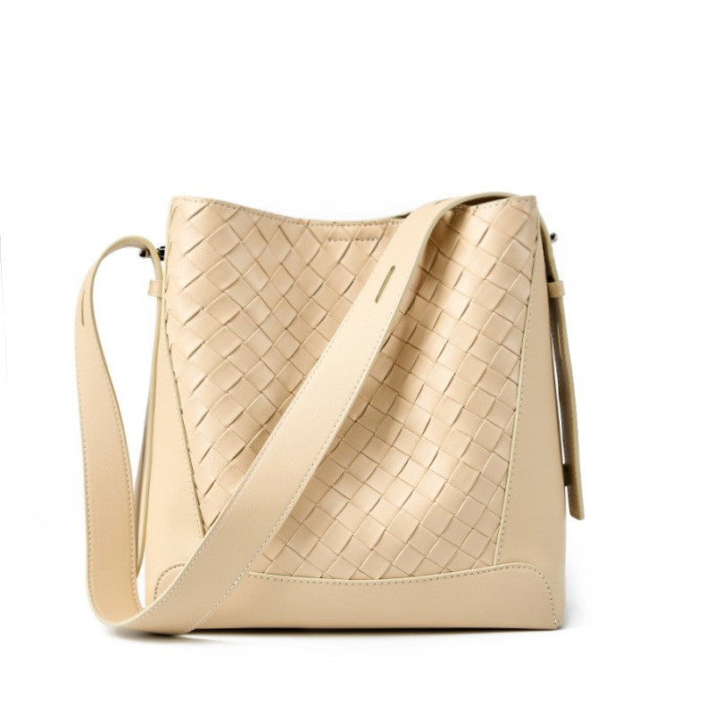 The white woven tote bucket hobo shoulder bag womens is made of soft genuine leather, with an adjustable crossbody sling strap.