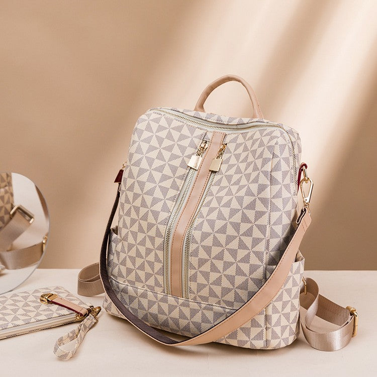 The beige convertible laptop shoulder backpack has 2 side pockets for umbrella and bottles.