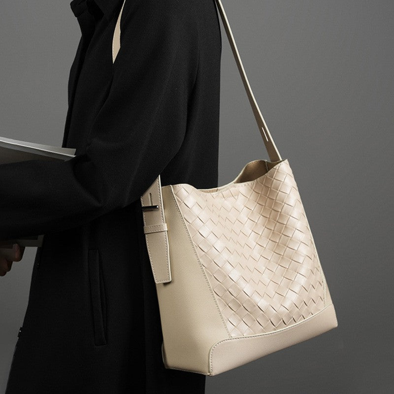 The women's beige white woven bucket tote hobo bag is made of genuine leather, with an adjustable sling crossbody strap, suitable for work, beach, party, meeting and daily use.