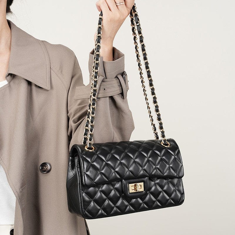 This black flap sling shoulder bag is adjustable; it can be carried by crossbody or on the shoulder.
