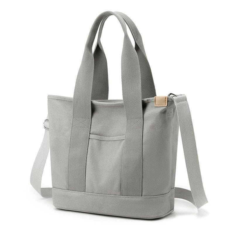 The medium grey zip tote bag for ladies is ideal for travel, work, beach and school.