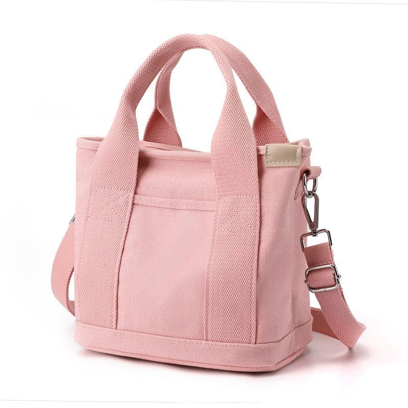 The pink small canvas tote bags with zipper are heavy duty, with multi pockets.