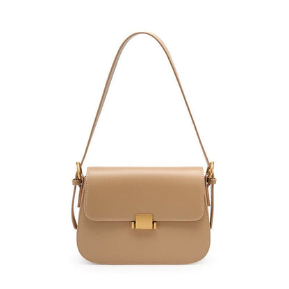 The Apricot Khaki Beige shoulder crossbody bag is made of genuine leather.