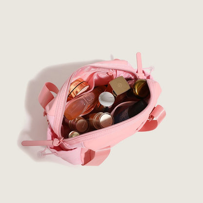The Belluova mini gym bag is spacious, with multi pockets for phone, power bank, bottle, makeup, cosmetics