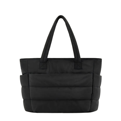 The black puffer fluffy tote bag is big and cute.