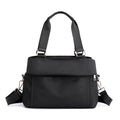 The black top handle tote bag has a replacement crossbody bag