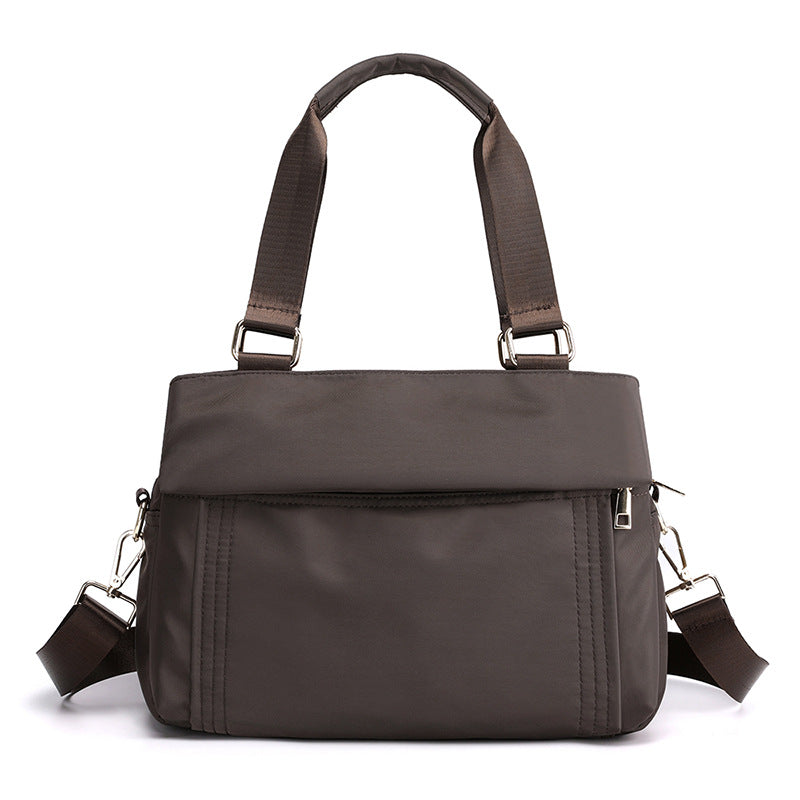 This is the coffee top handle work tote bag, it is made of waterproof oxford.