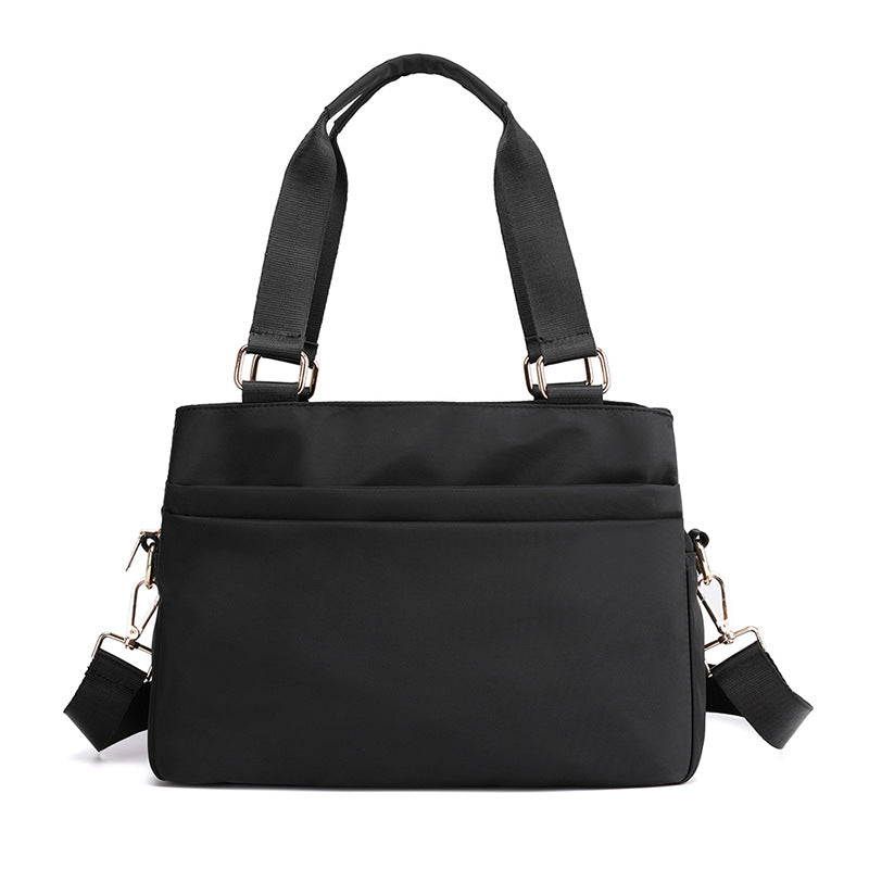 This is the back of the top handle work tote bag, and it has 2 pockets on the back.