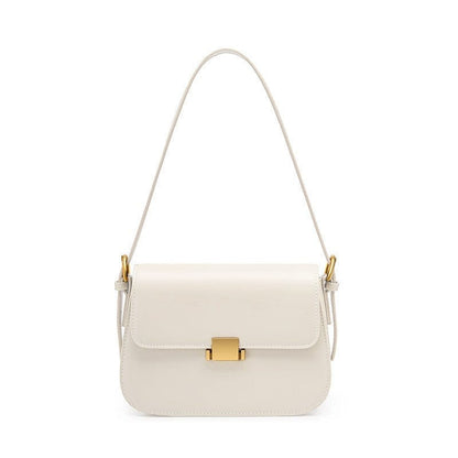 The white sling messenger has a minimalist and classic design and a camera shape. It is versatile and practical.