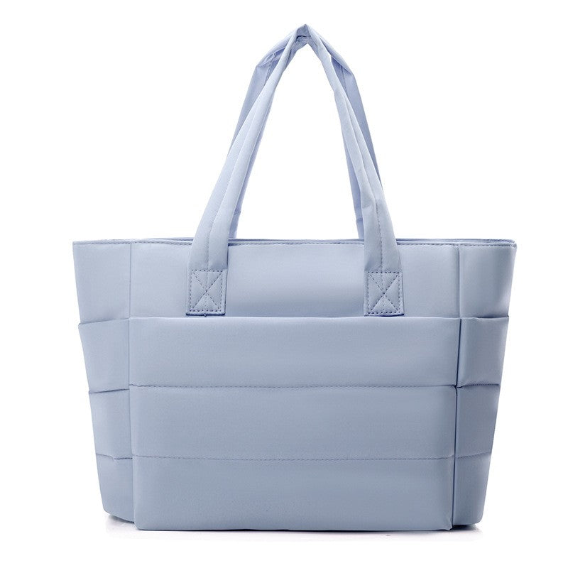 Blue puffer tote bag is soft and large capacity