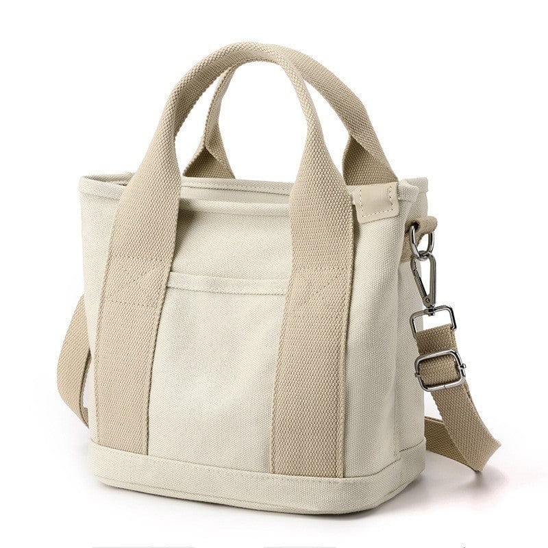 The medium khaki blank canvas tote bag has lots of compartments and soft handles.