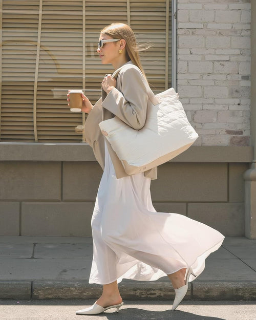 This fashionable and stylish 2 in 1 puffer tote bag is suitable for work, travel and shopping.
